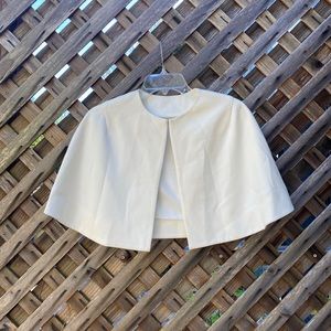 White shoulder cape